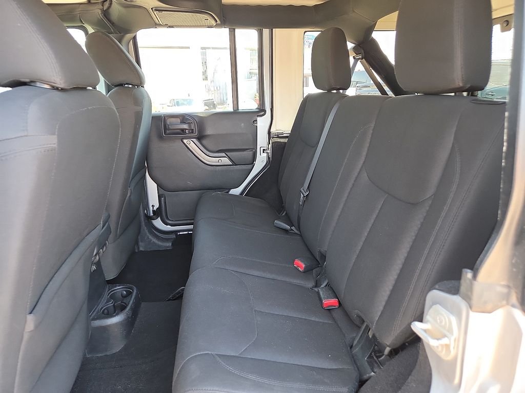 Used 2016 Billet Silver Metallic Clearcoat Jeep Unlimited Sport image 17