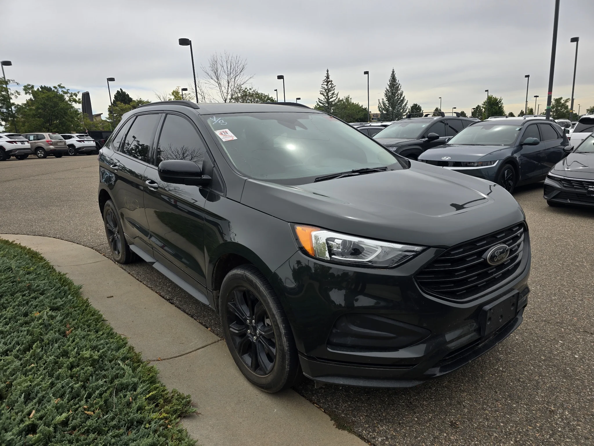 Used 2024 Forged Green Metallic Ford SE image 8