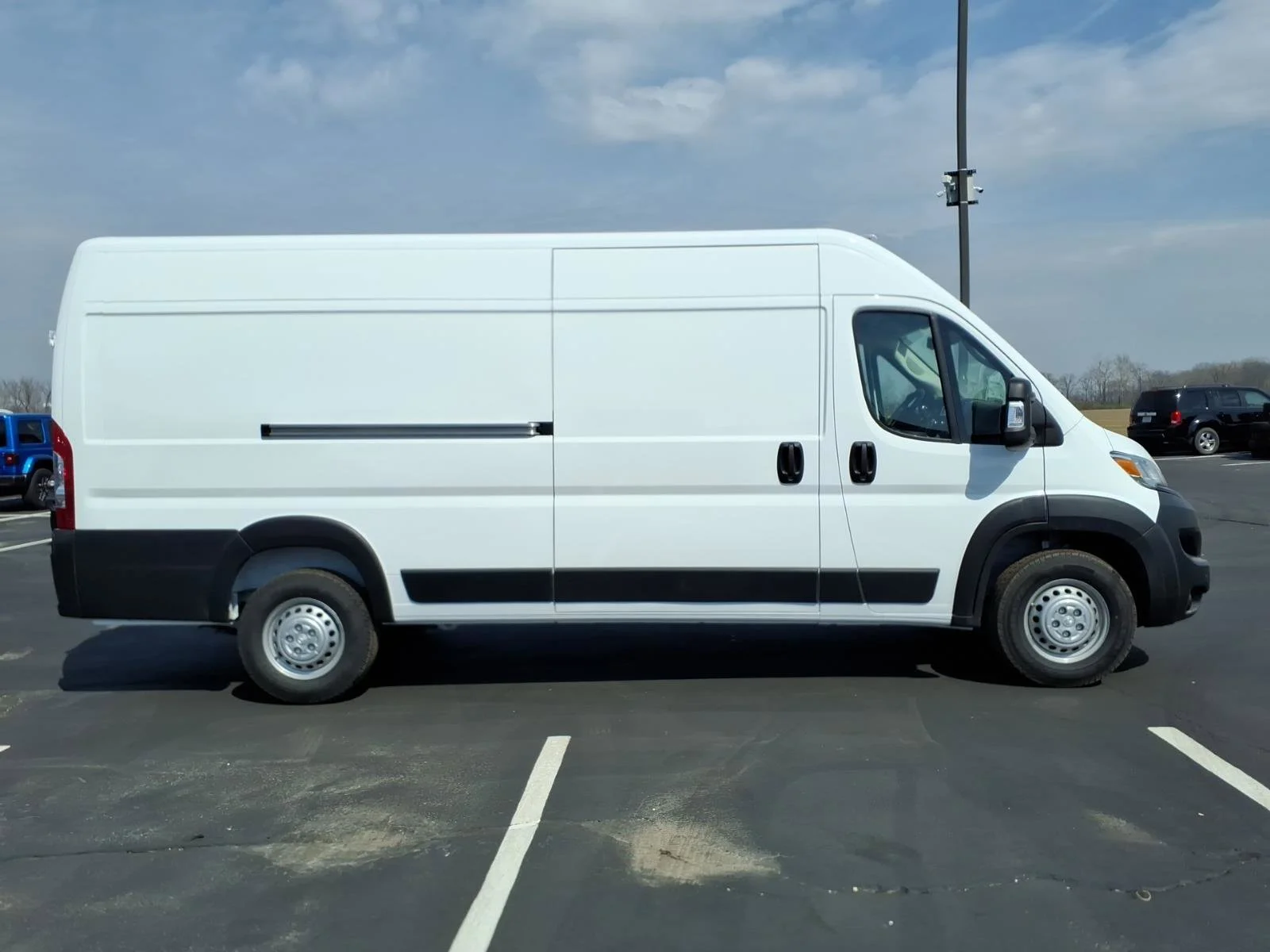 New 2026 Bright White Clear-Coat Exterior Paint RAM High Roof image 19