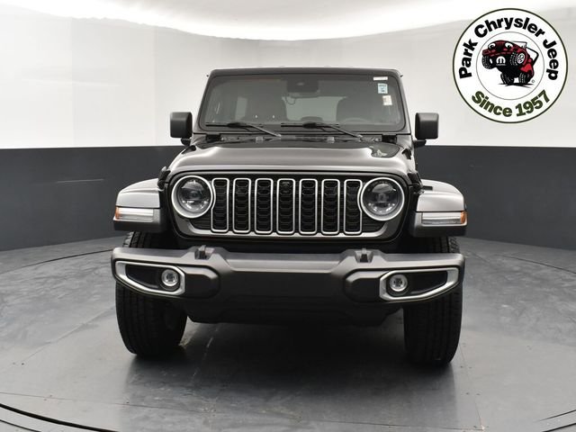 Used 2024 Jeep Wrangler 4-Door Sahara with VIN 1C4PJXEG5RW346226 for sale in Burnsville, Minnesota