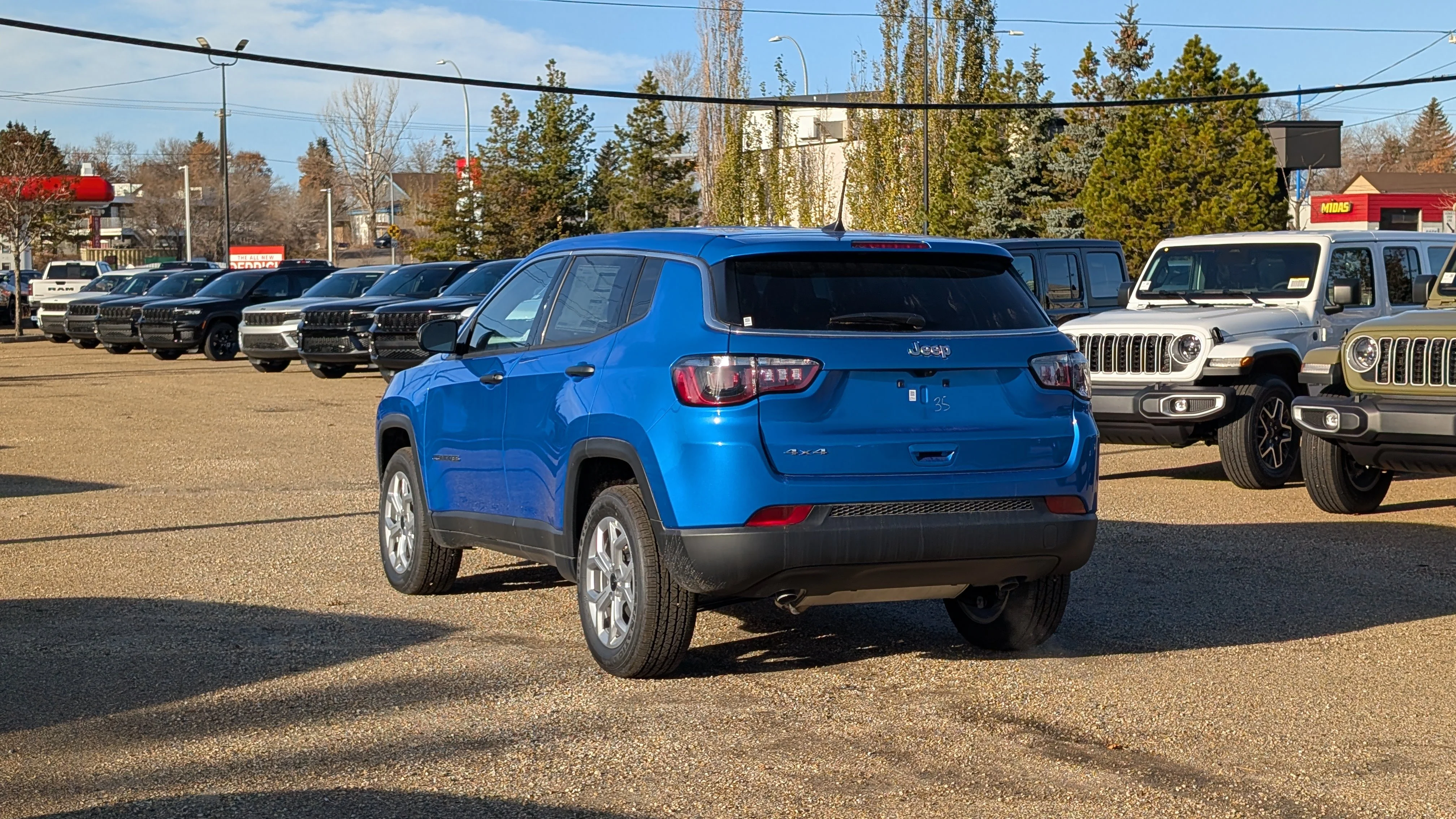 New 2026 Laser Blue Pearl Jeep Sport image 4