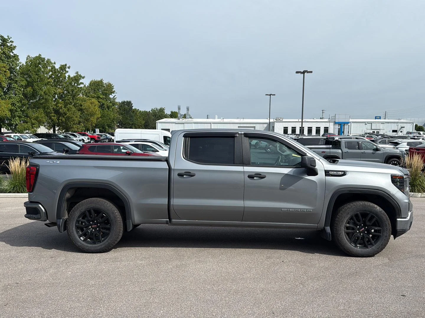 Used 2024 Sterling Metallic GMC Pro image 2
