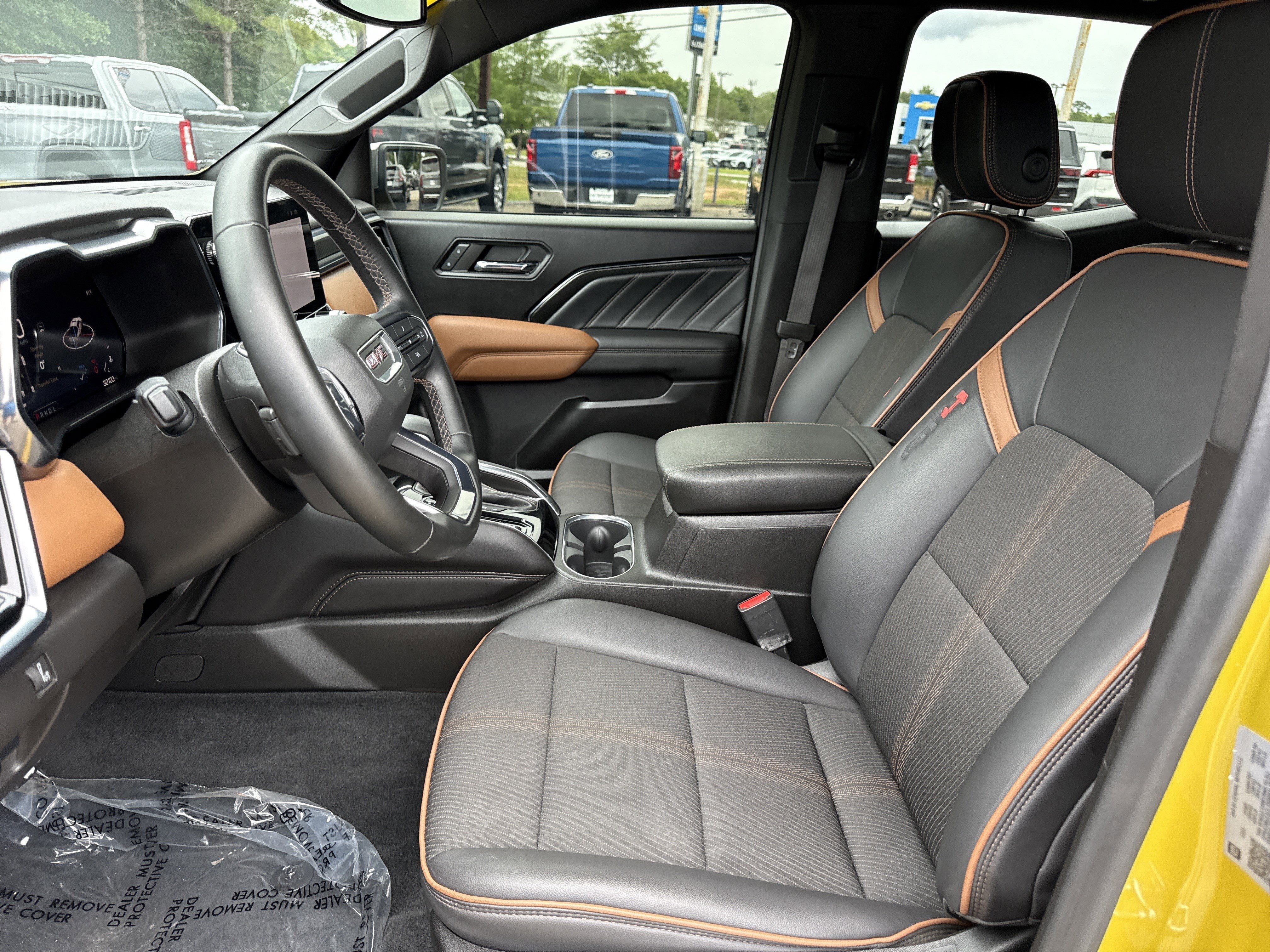 Used 2024 Solar Flare Metallic GMC 4WD AT4 image 11