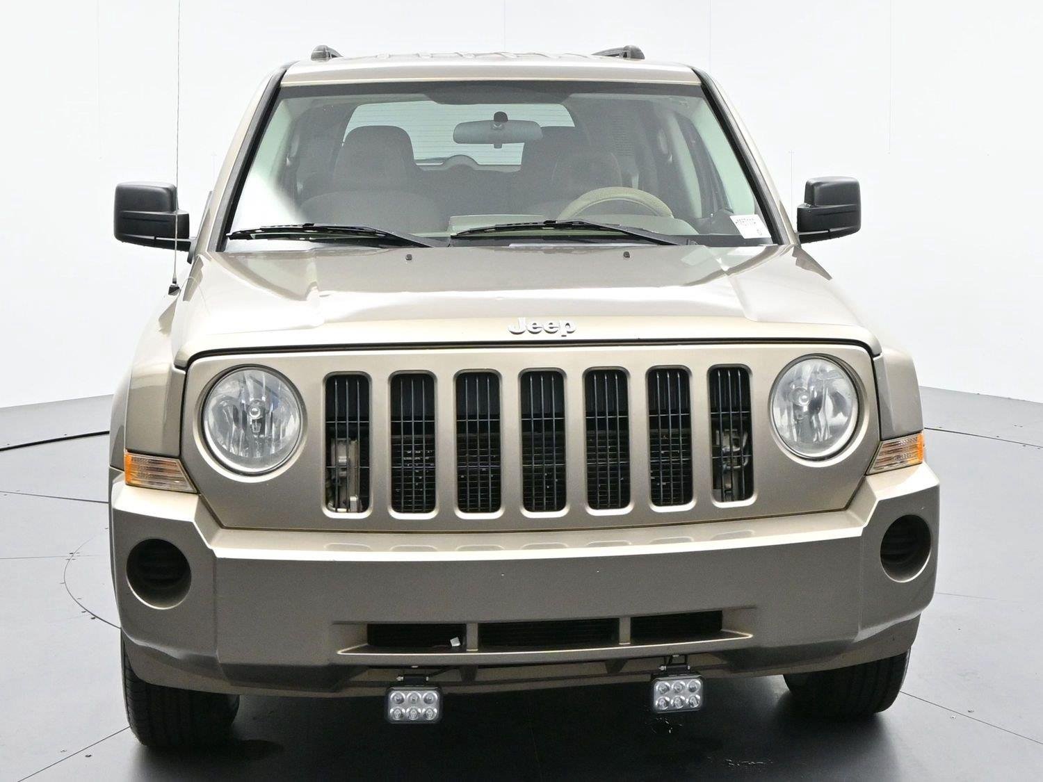 Used 2008 Light Khaki Metallic Jeep Sport image 2