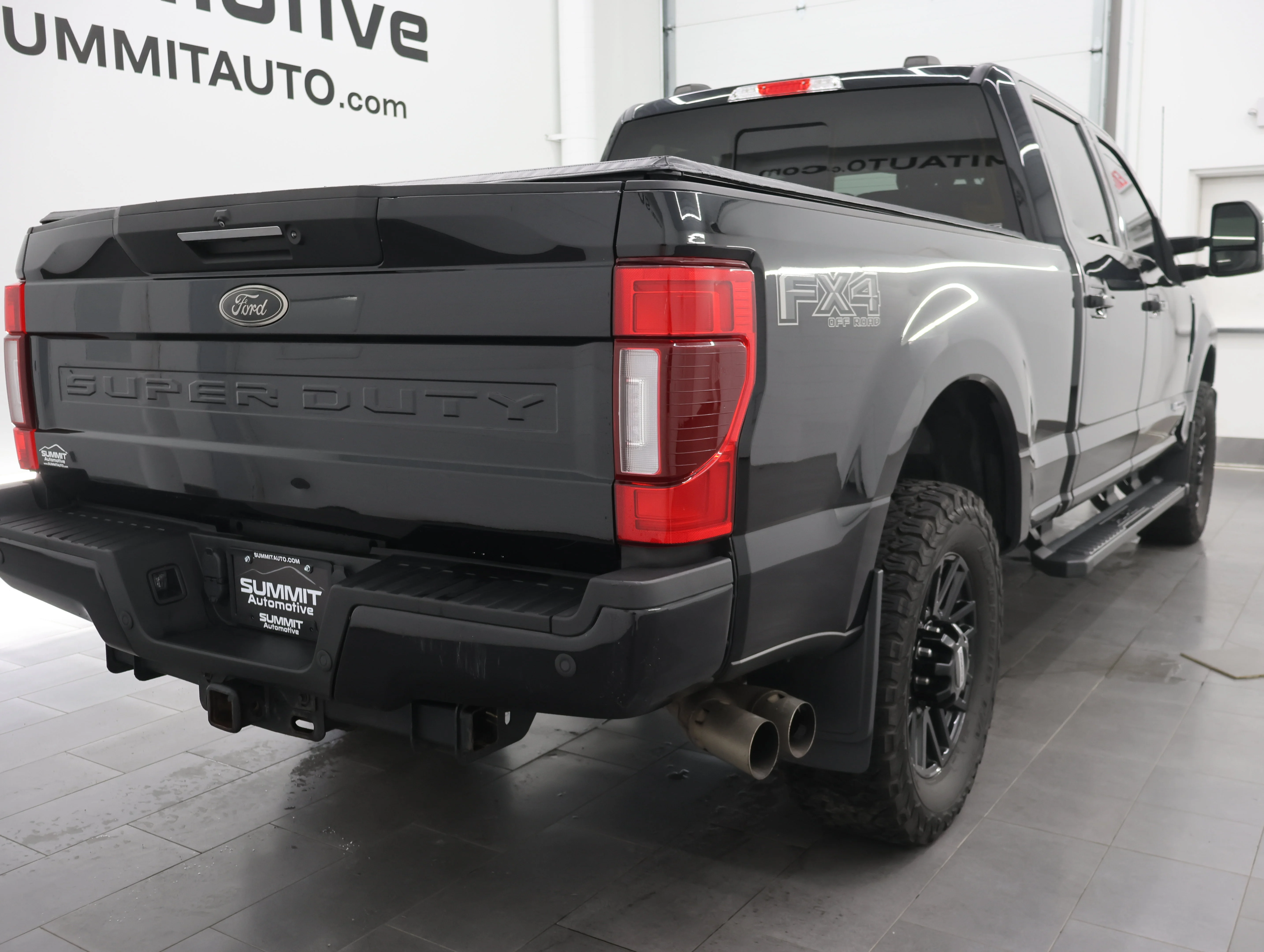 Used 2022 Agate Black Metallic Ford Lariat image 4