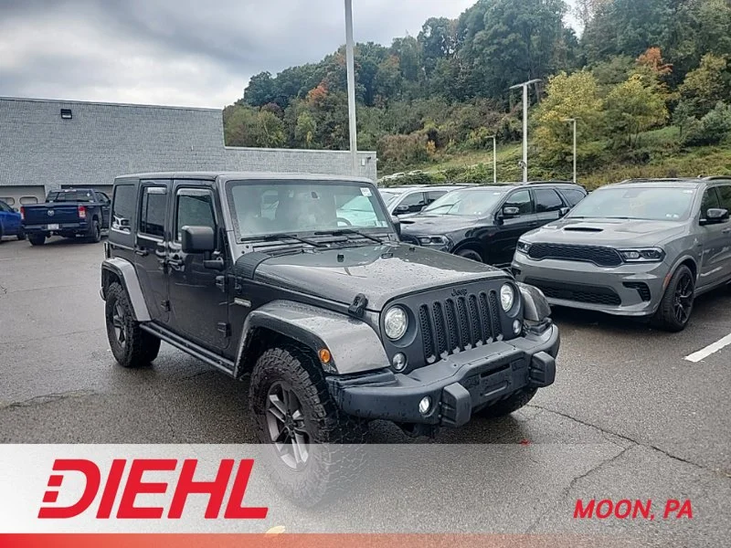 Used 2018 Gray Jeep Unlimited Sport image 1