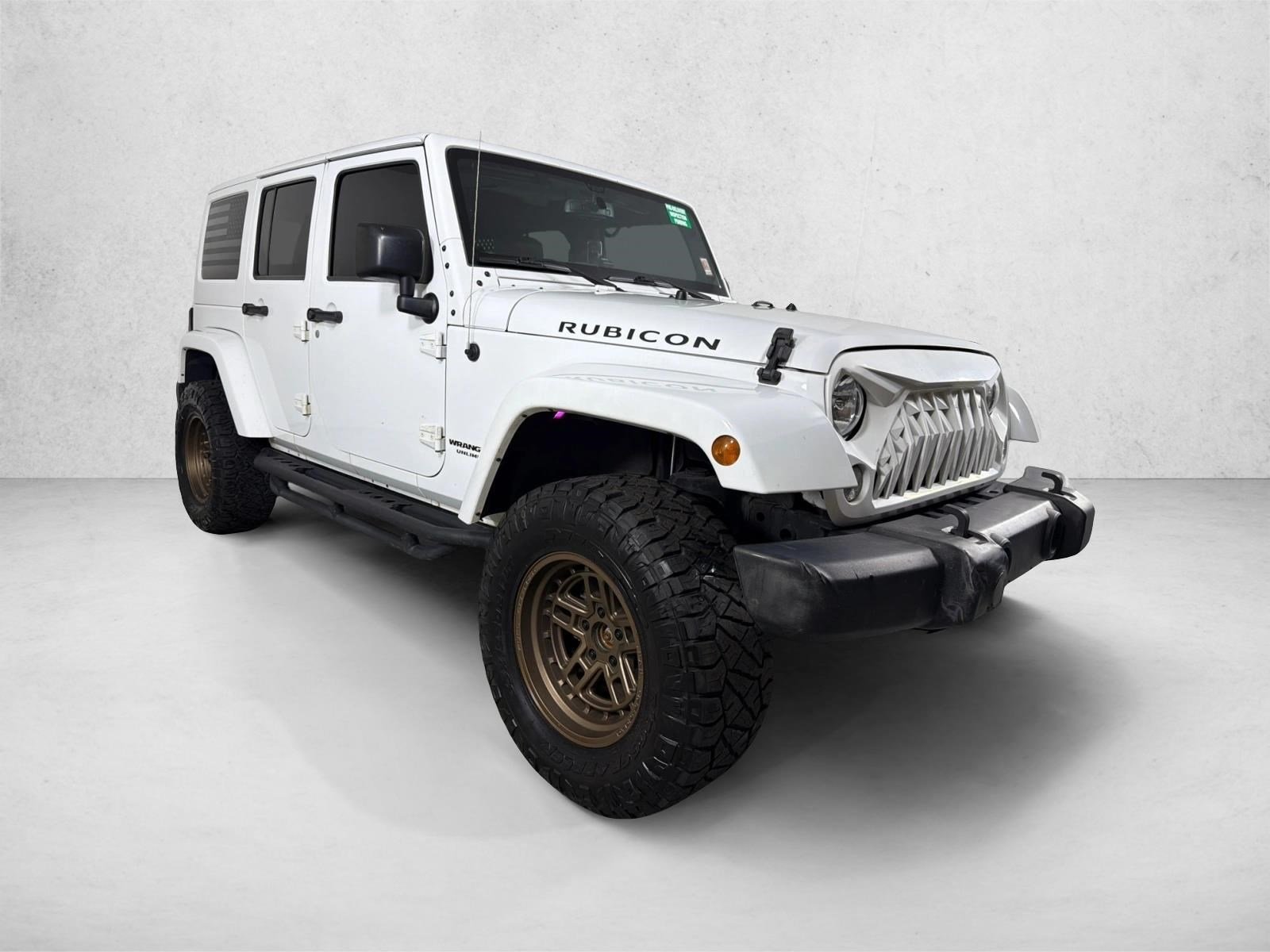 Used 2016 Bright White Clearcoat Jeep Rubicon image 1