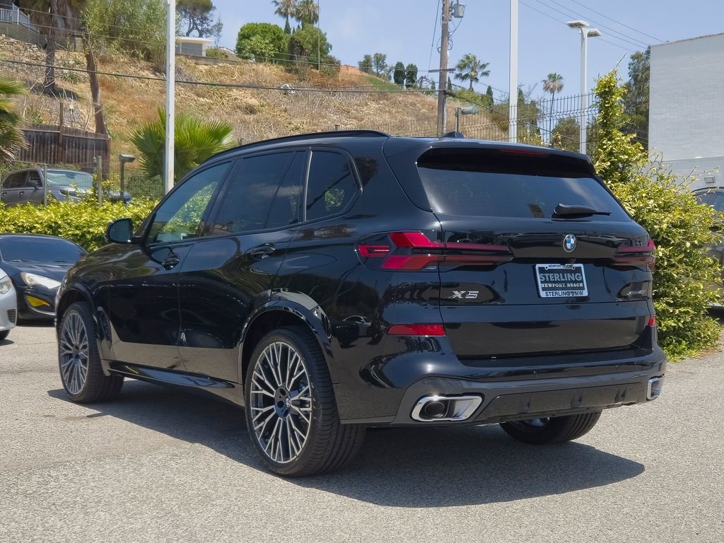 New 2026 Black Sapphire Metallic BMW xDrive40i image 15