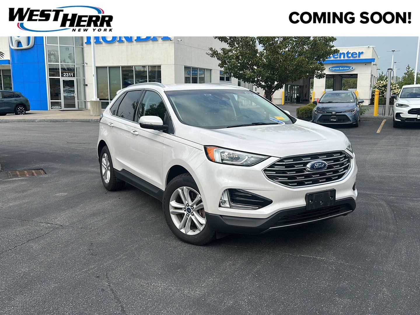 Used 2019 White Platinum Metallic Tri-Coat Ford SEL image 1