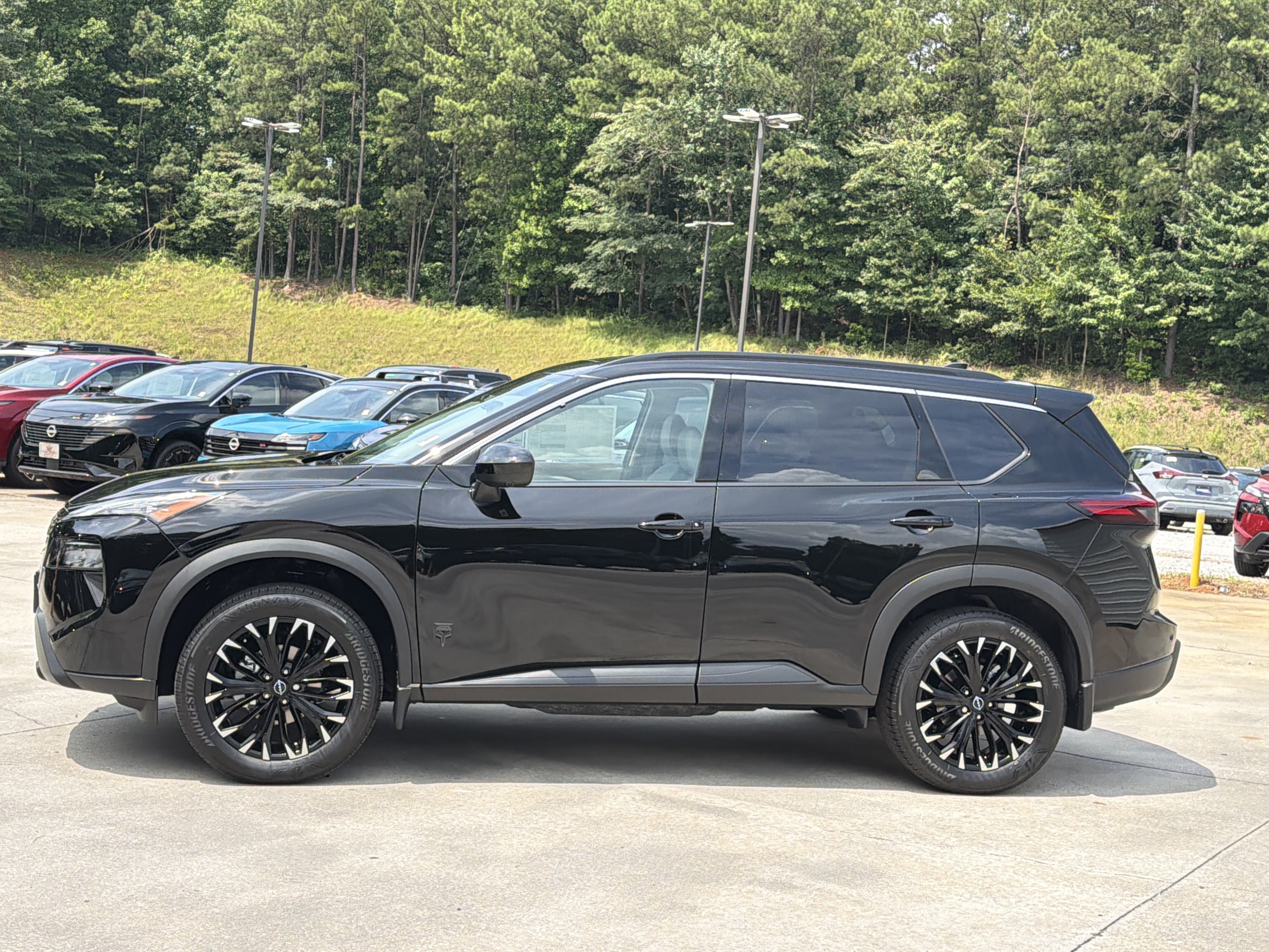New 2026 Super Black Nissan Dark Armor image 5