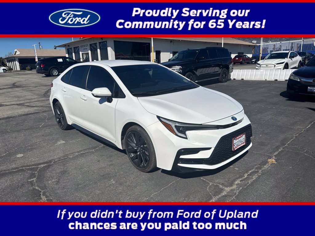 Used 2025 White Toyota SE image 1