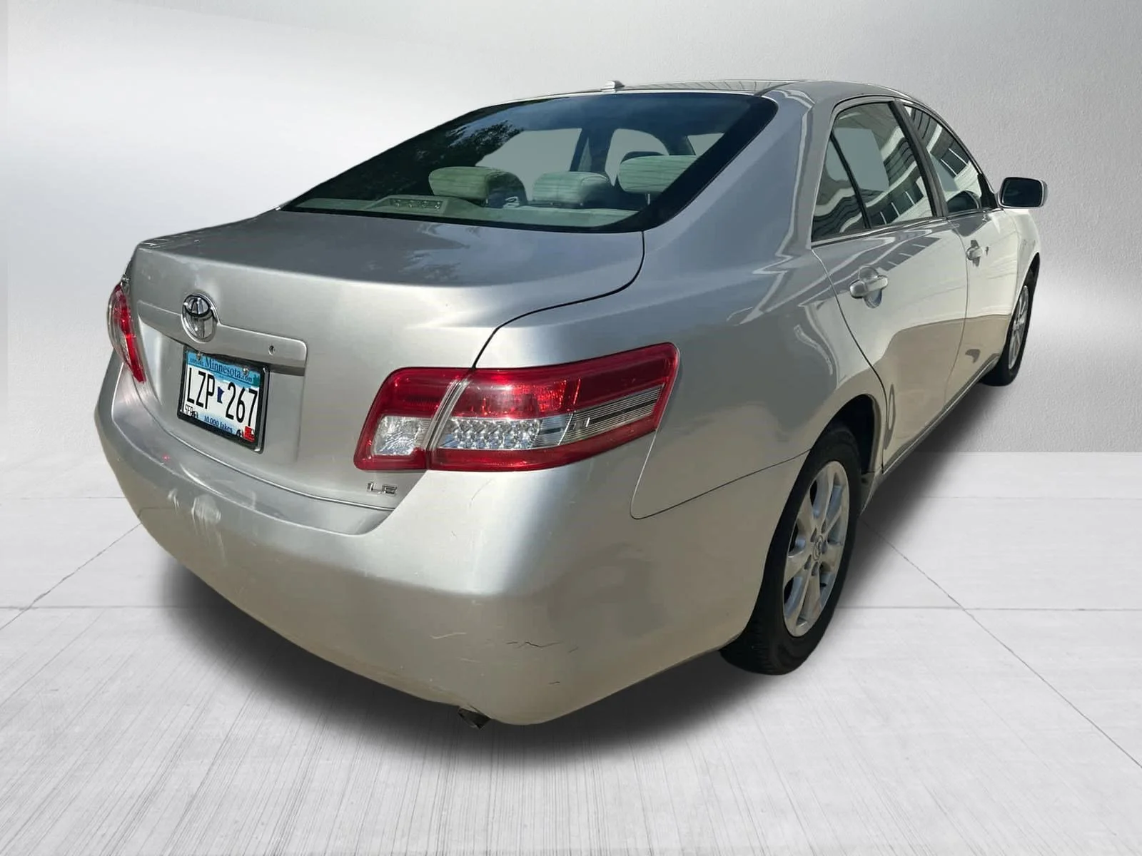 Used 2011 Classic Silver Metallic Toyota LE image 4