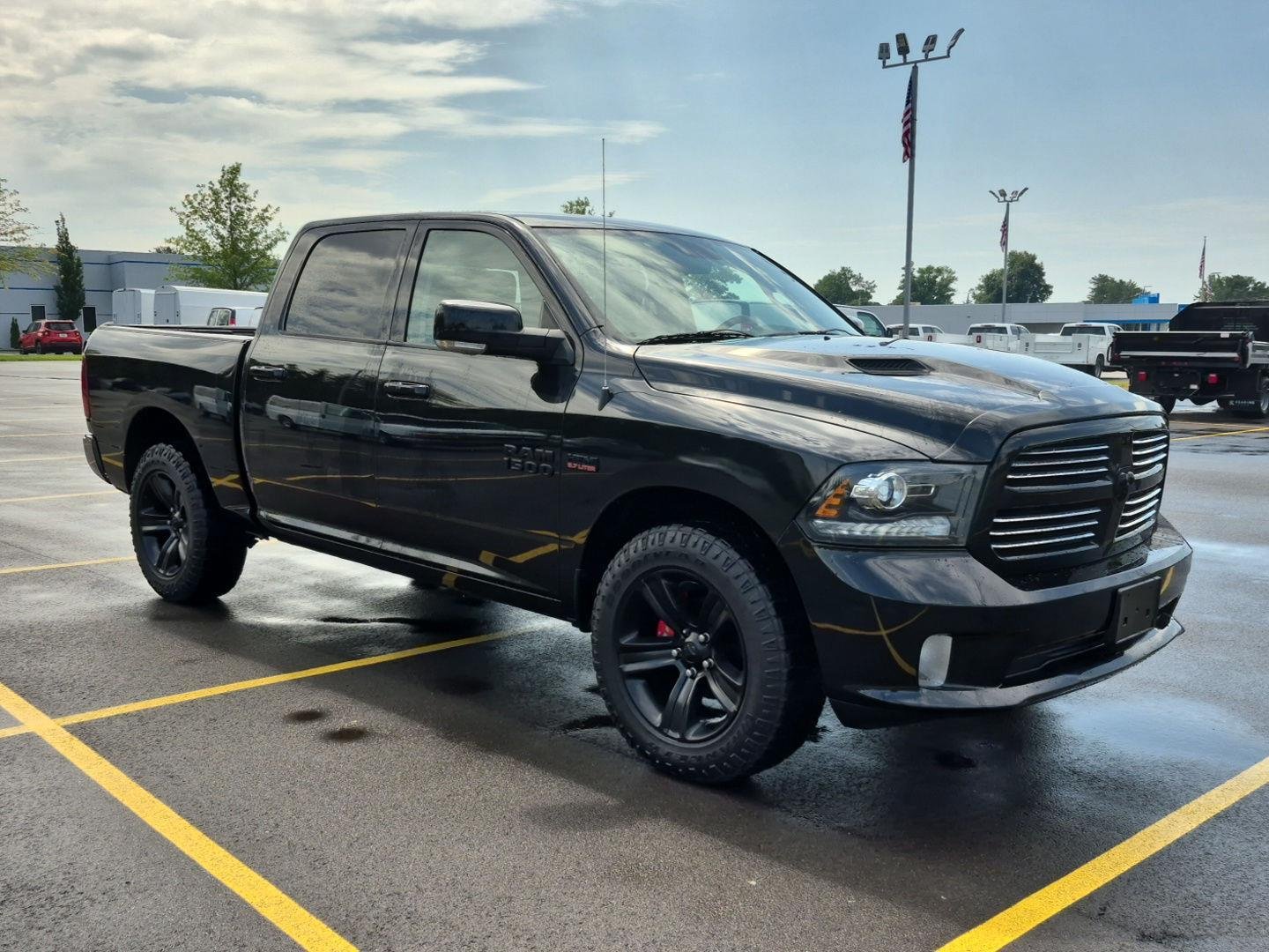 Used 2016 Brilliant Black Crystal Pearlcoat Ram Sport image 3