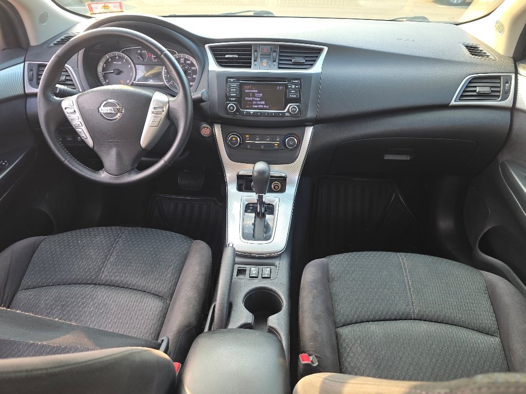 Used 2015 Super Black Nissan SR image 2