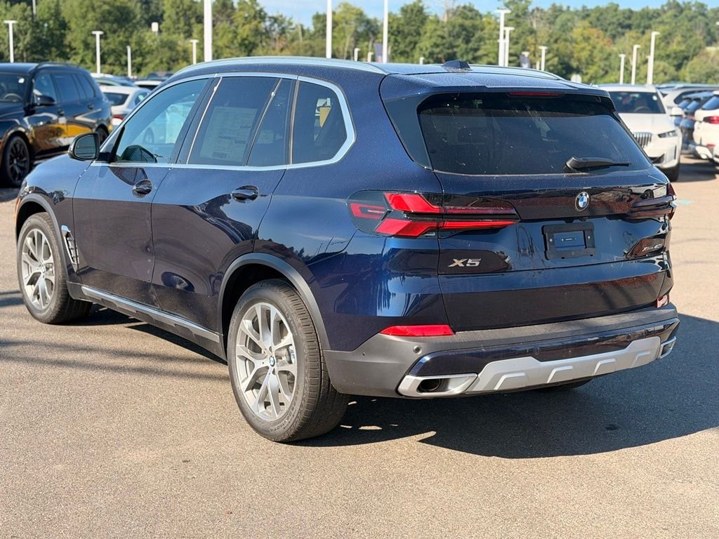New 2026 Tanzanite Blue II Metallic BMW xDrive40i image 3