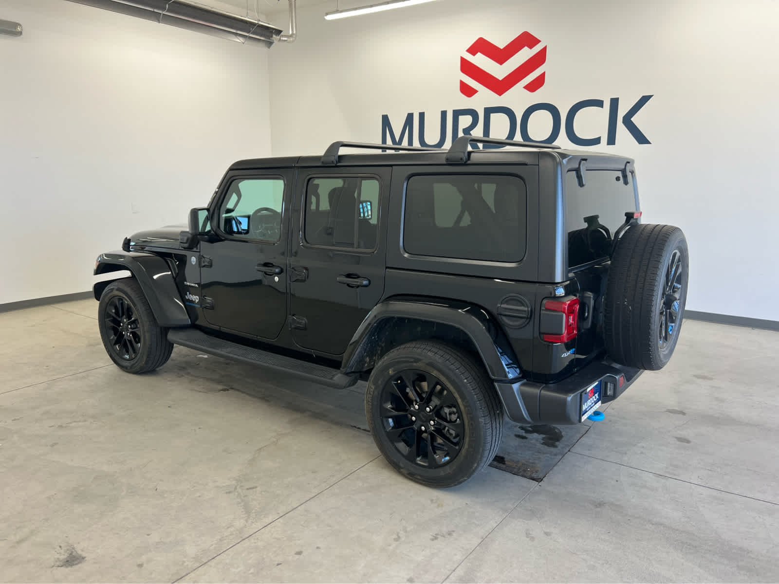 Used 2023 Jeep Wrangler 4xe Sahara 4XE with VIN 1C4JJXP66PW579314 for sale in Logan, UT