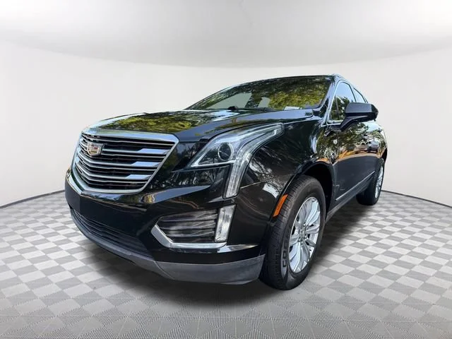 Used 2017 STELLAR BLACK METALLIC Cadillac FWD image 1