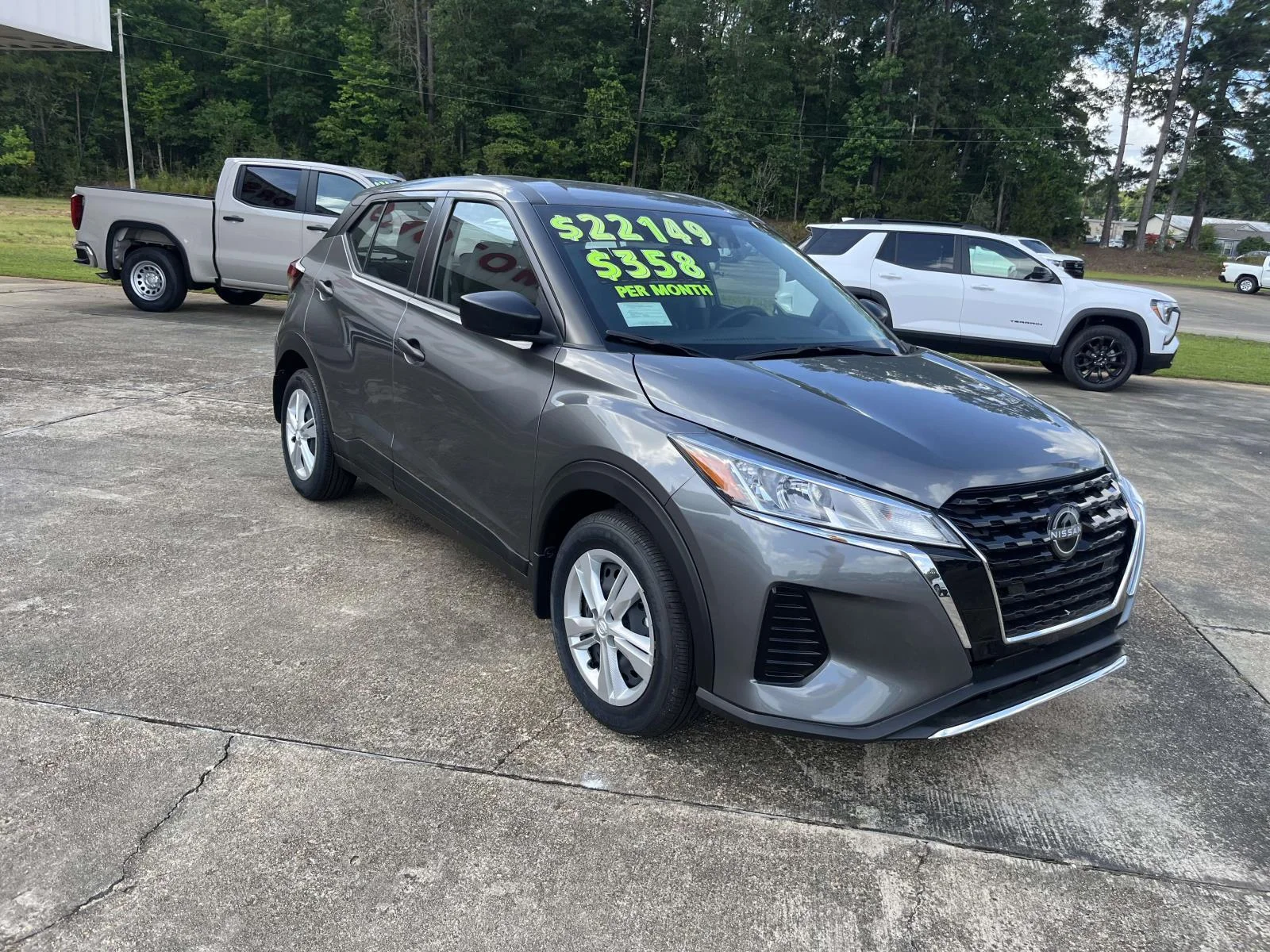 Used 2025 GUN METALLIC Nissan S FWD image 3