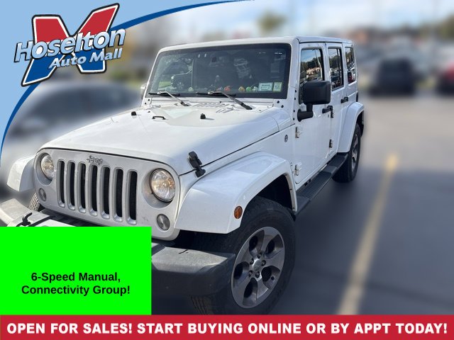 Used 2016 White Jeep Unlimited Sahara image 1