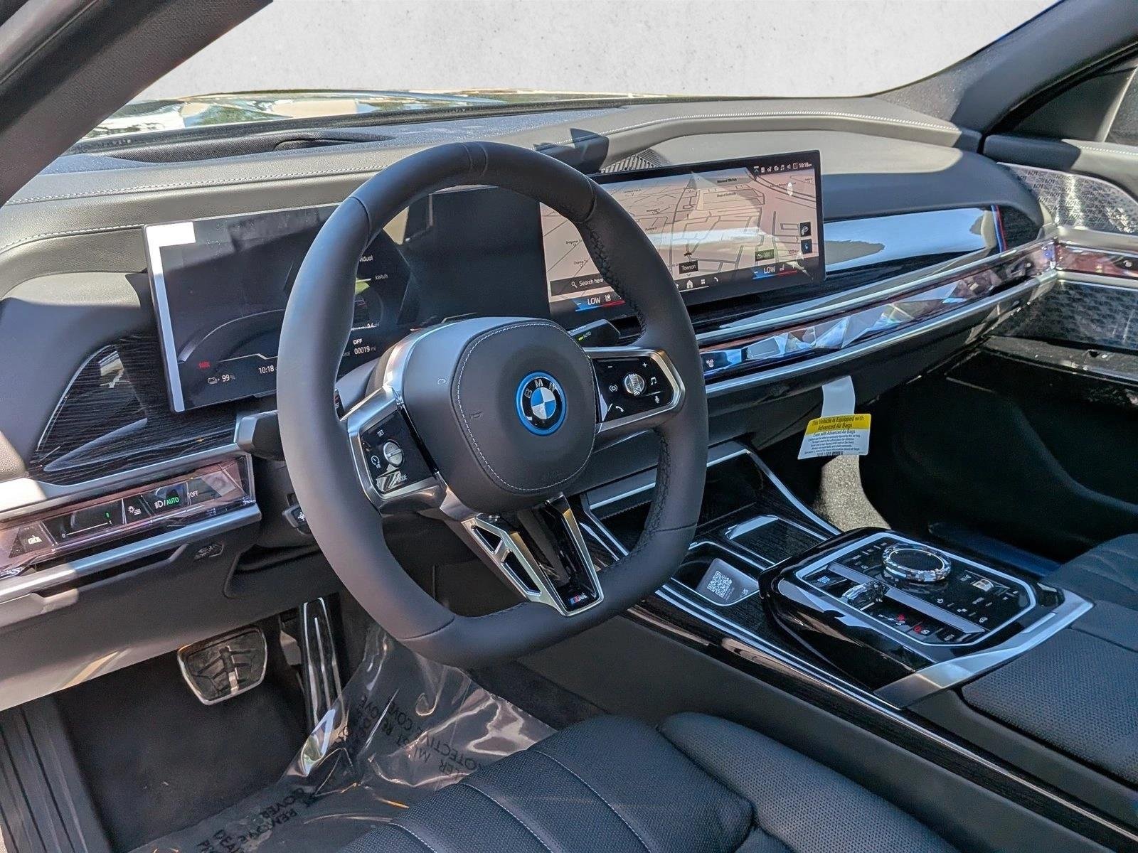 Used 2026 Carbon Black Metallic BMW xDrive60 image 3