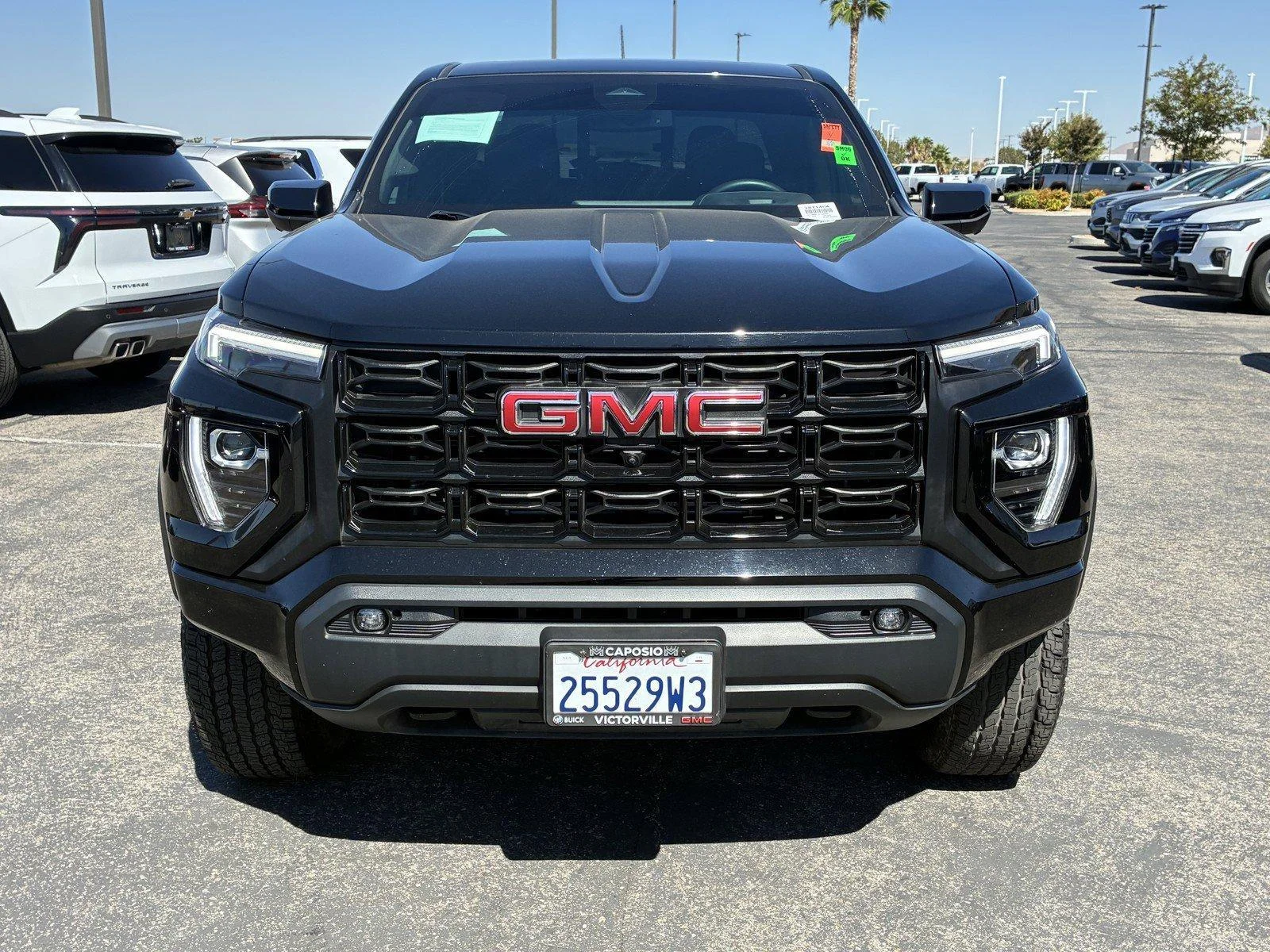Used 2023 ONYX BLACK GMC 4WD Elevation image 2