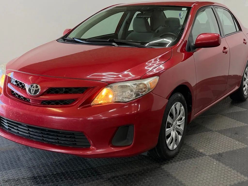 Used 2012 Barcelona Red Metallic Toyota LE image 2