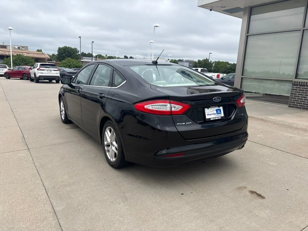 Used 2014 Tuxedo Black Metallic Ford SE image 7