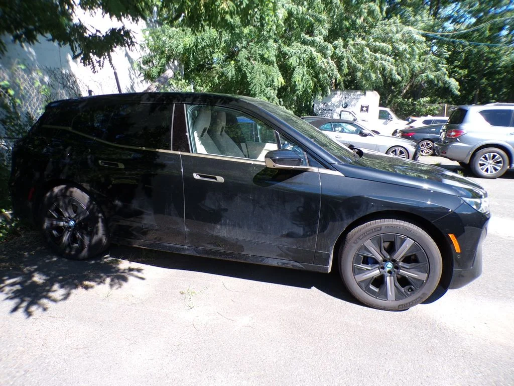 Certified Used 2024 Black BMW xDrive50 image 4