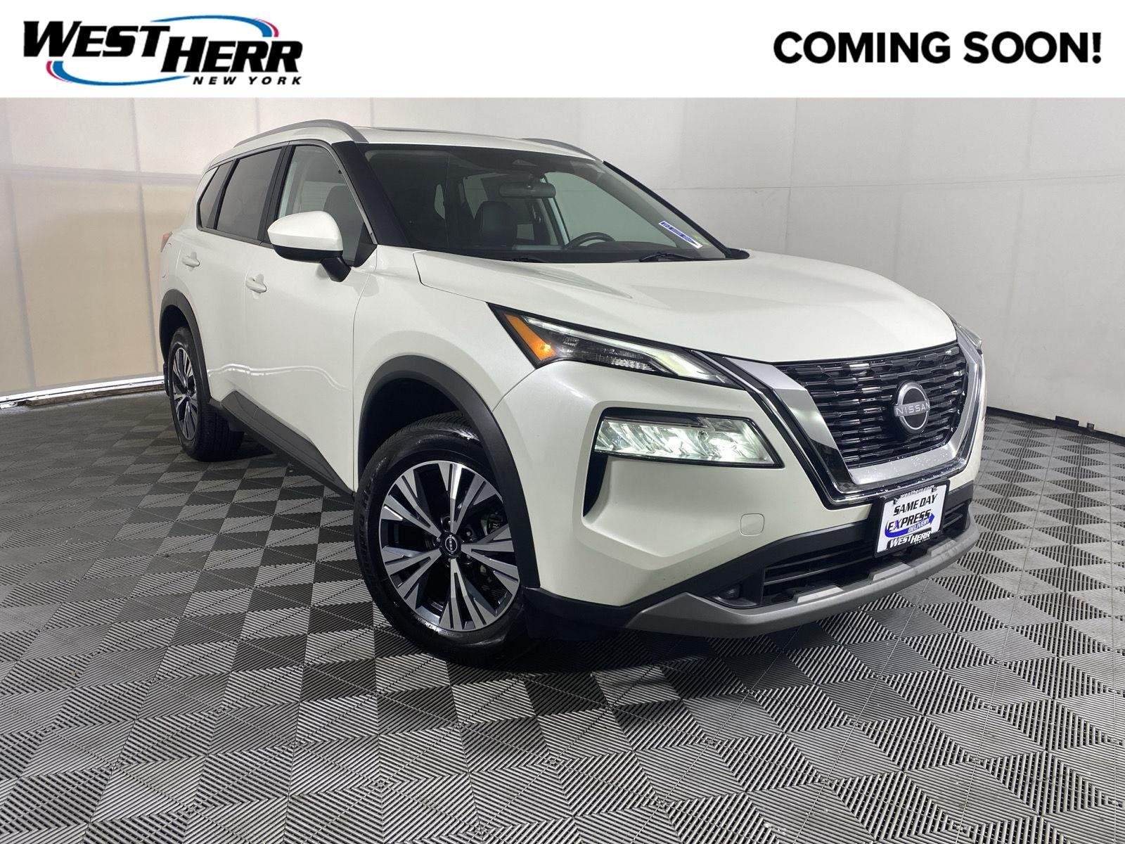 Used 2023 Pearl White Tricoat Nissan SV image 1