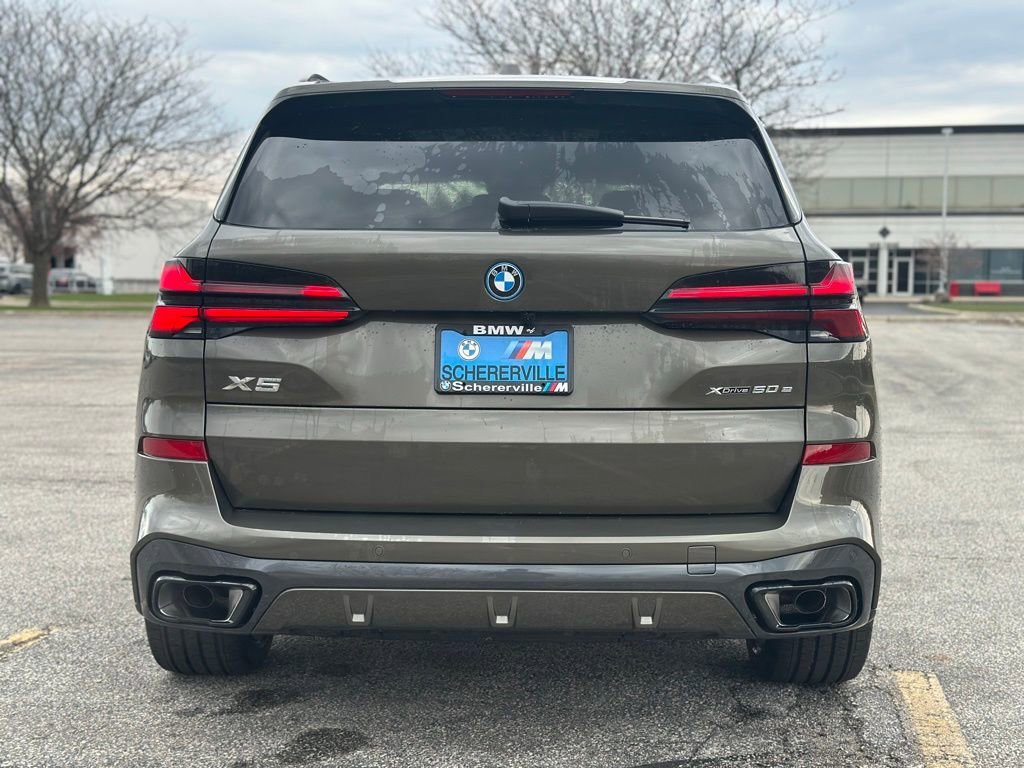 New 2026 Manhattan Green Metallic BMW xDrive50e image 6