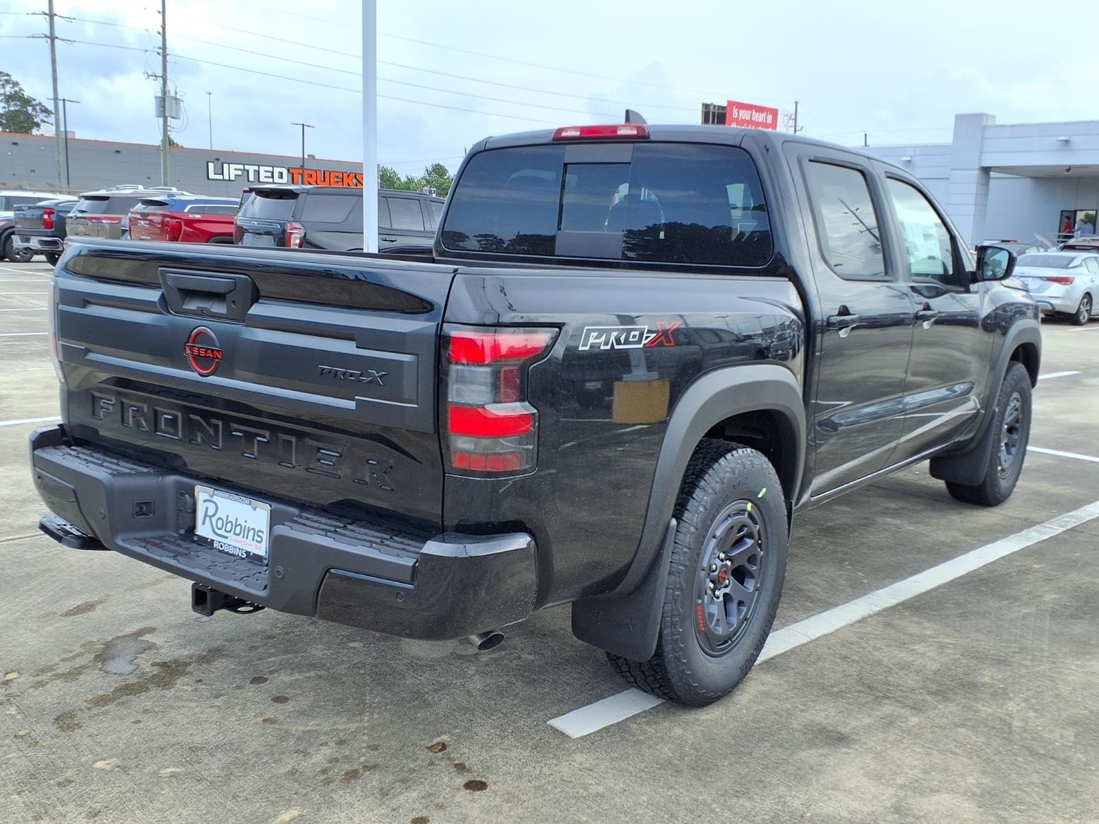 New 2026 Super Black Nissan Crew Cab PRO-X® image 2