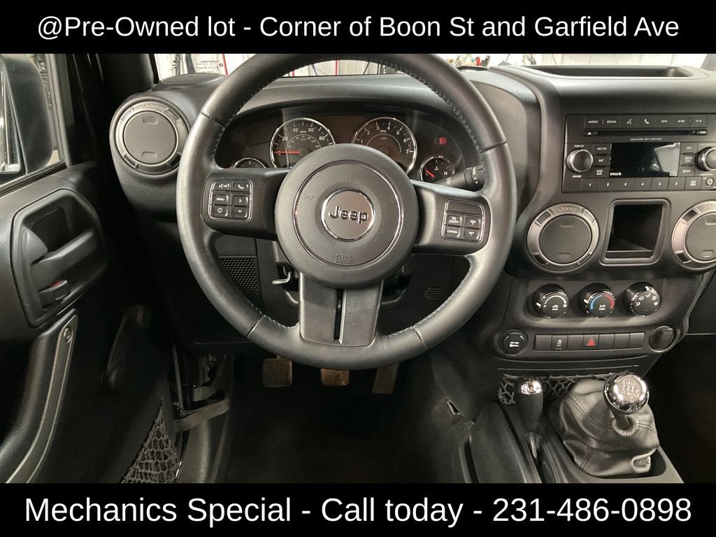 Used 2015 Black Jeep Unlimited Sport image 16