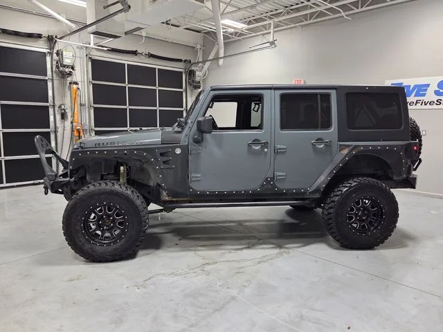 Used 2014 Gray Jeep Unlimited Rubicon image 4