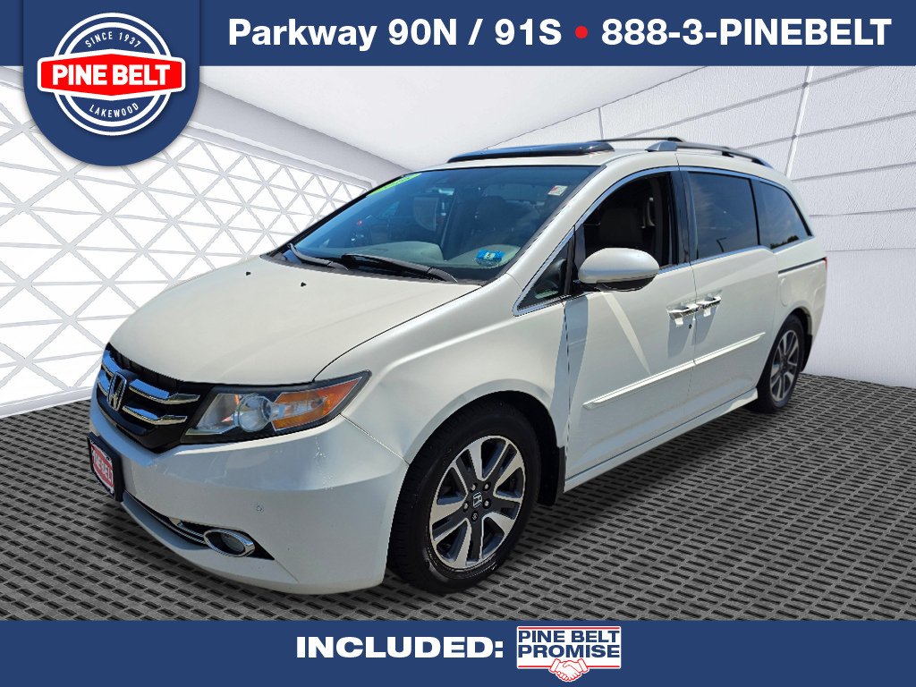 Used 2016 White Diamond Pearl Honda Touring Elite image 1
