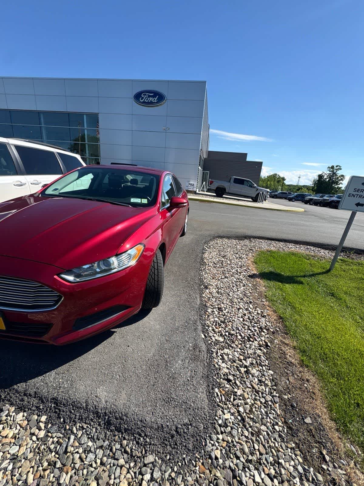 Used 2016 Ruby Red Tinted Clearcoat Ford SE image 5