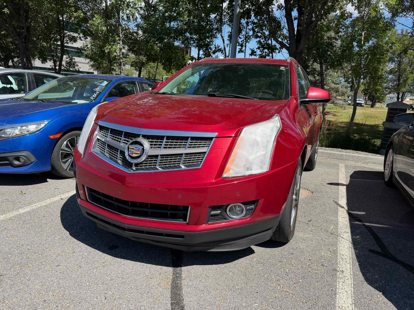 Used 2012 Crystal Red Tintcoat Cadillac Performance Collection image 2