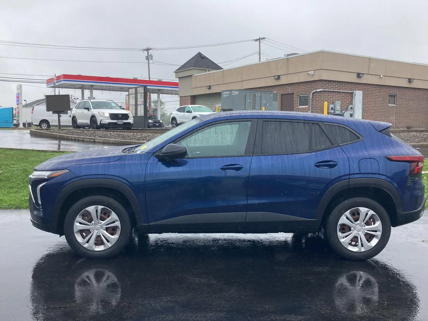 Used 2024 Blue Glow Metallic Chevrolet LS image 4