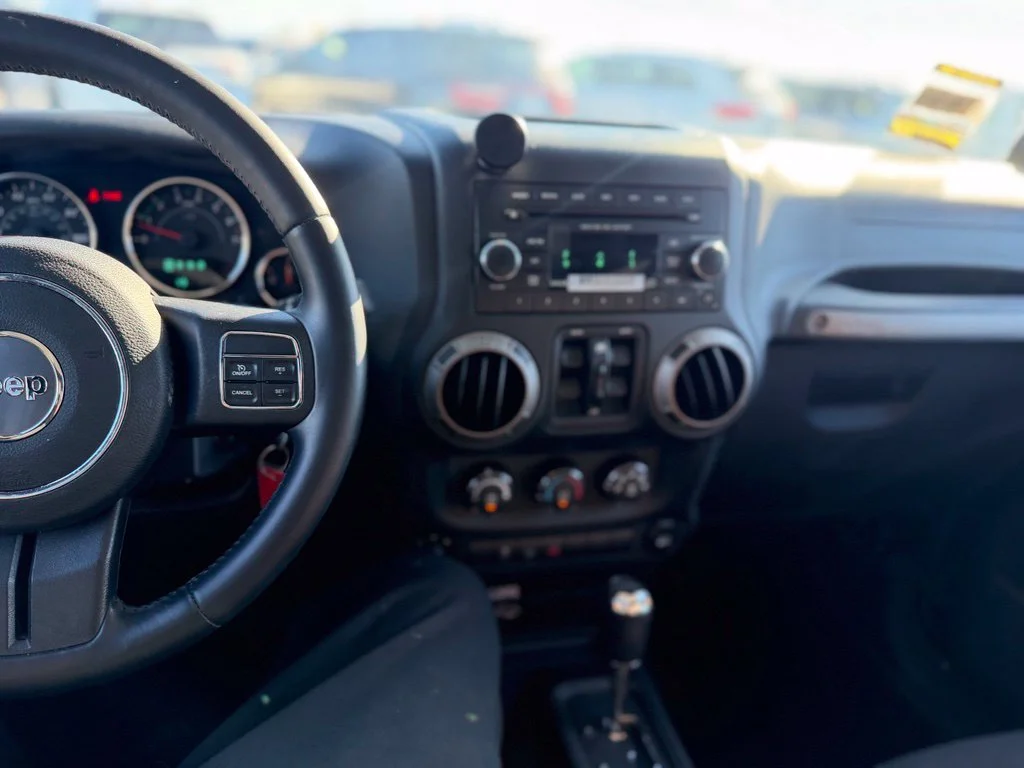 Used 2014 Black Jeep Unlimited Sport image 8