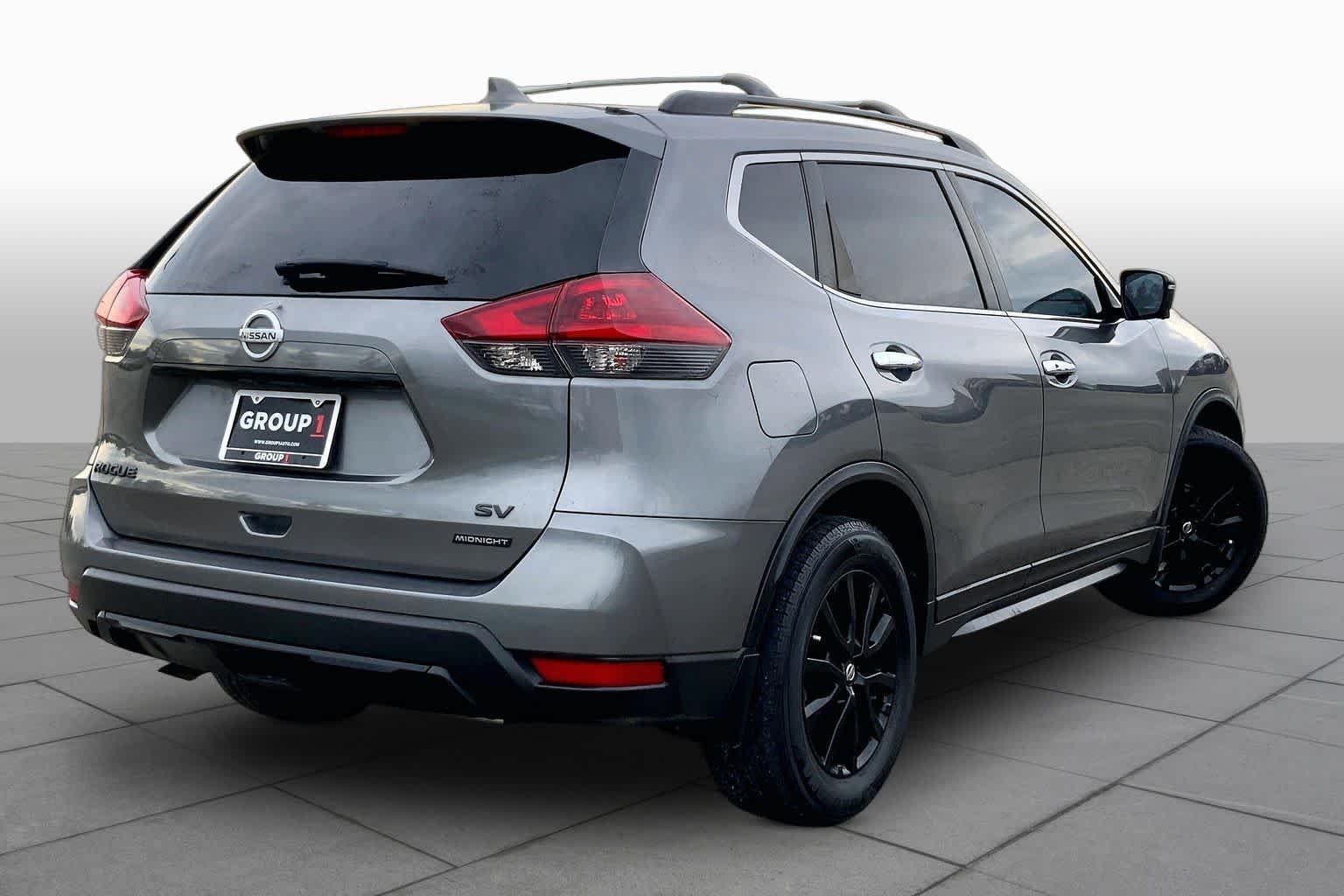 Used 2018 Gun Metallic Nissan SV image 13