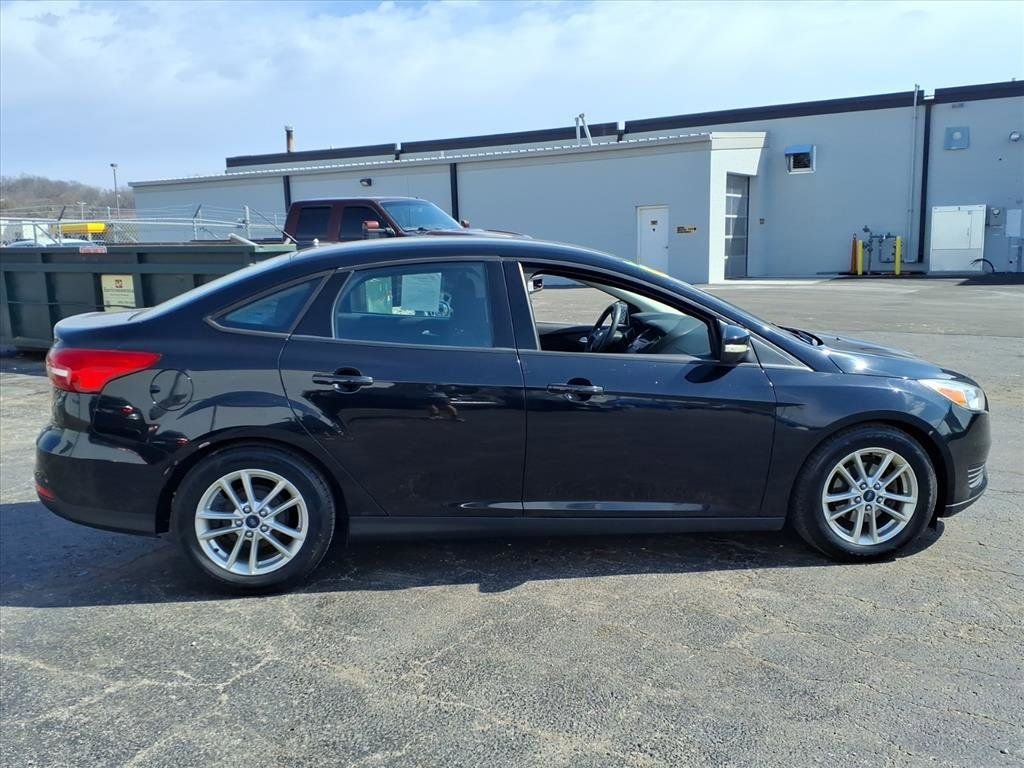 Used 2016 Ford Focus SE with VIN 1FADP3F22GL220021 for sale in Moline, IL