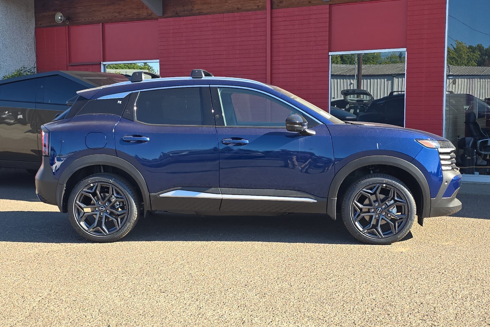 New 2026 Deep Blue Pearl Nissan SR image 3