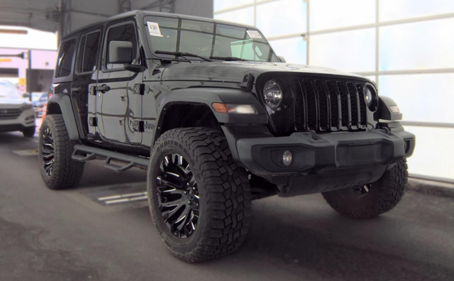 Used 2024 Black Jeep Sport S image 1