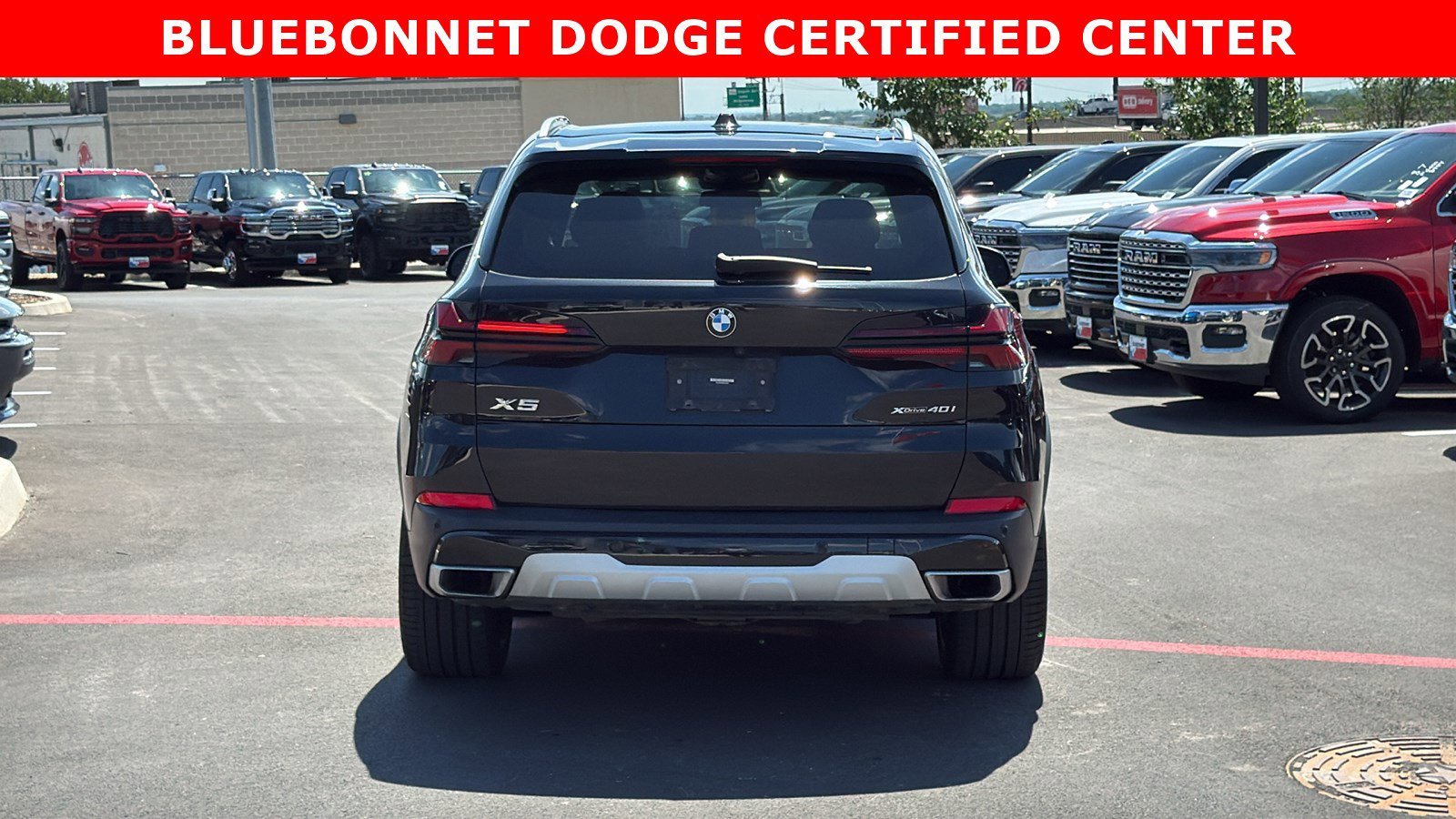 Certified Used 2024 Black Sapphire Metallic BMW xDrive40i image 4