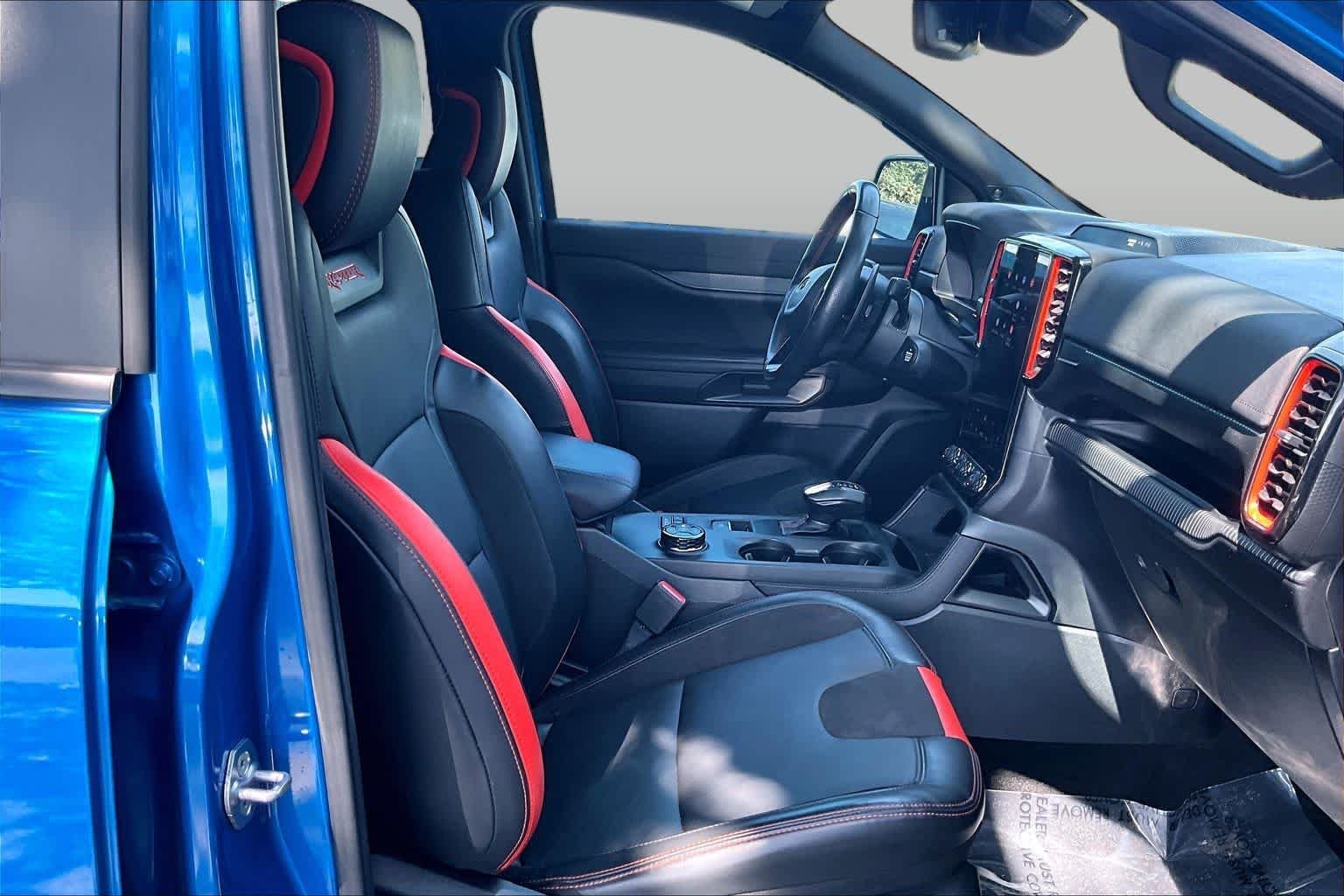 Used 2024 Velocity Blue Metallic Ford Raptor image 8
