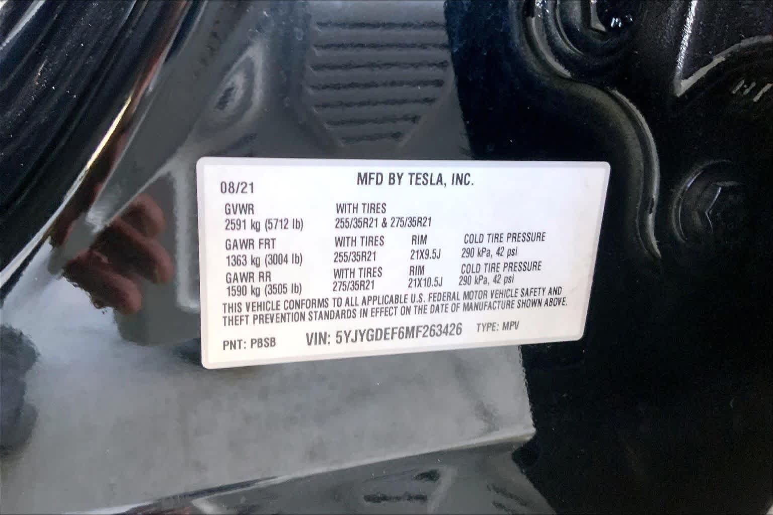Used 2021 Solid Black Tesla Performance image 31