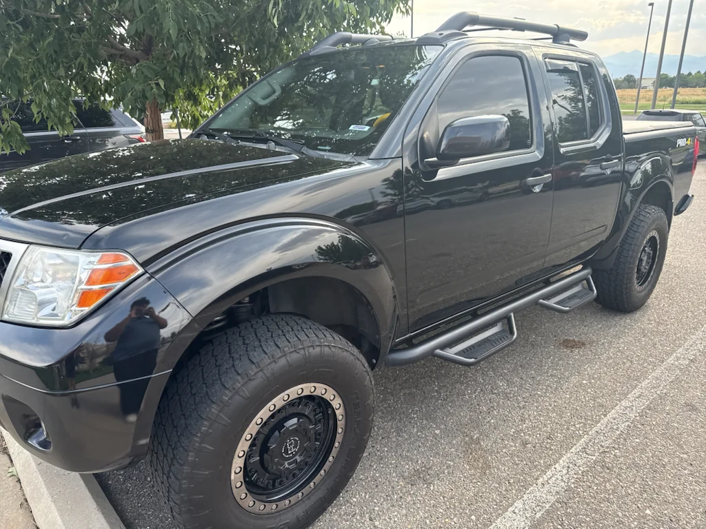 Used 2018 Magnetic Black Nissan PRO-4X image 1