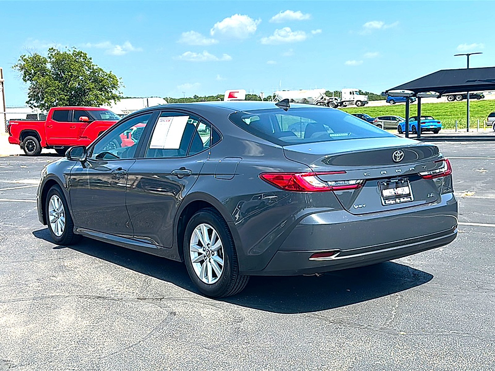 Used 2025 Super Black Toyota LE image 6