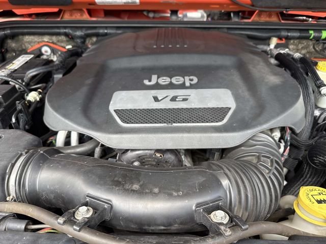 Used 2015 Orange Jeep Sahara image 12