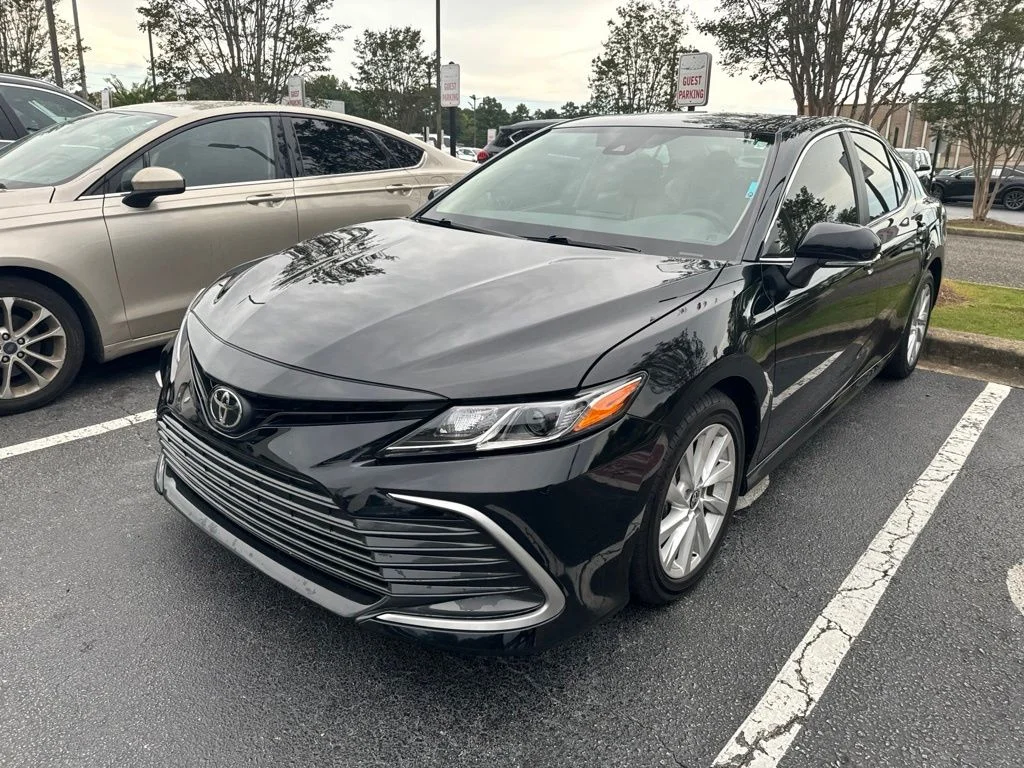 Used 2023 Black Toyota LE image 1