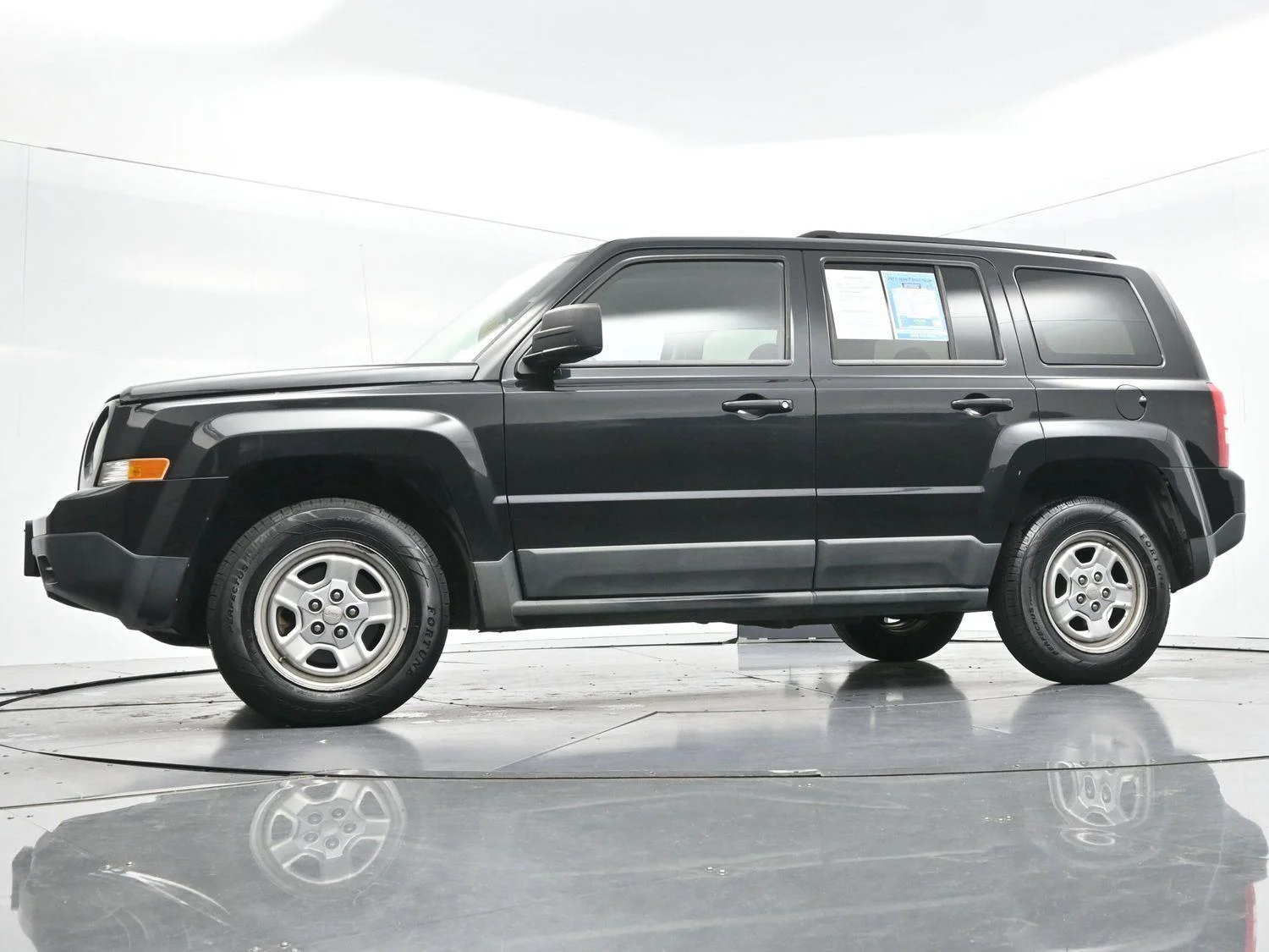 Used 2011 Brilliant Black Crystal Pearl Jeep Sport image 38